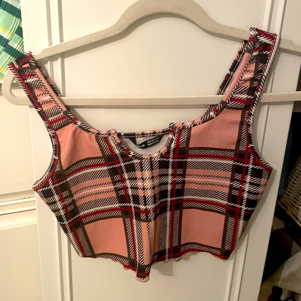 Pink, red, white and black plaid tank top.